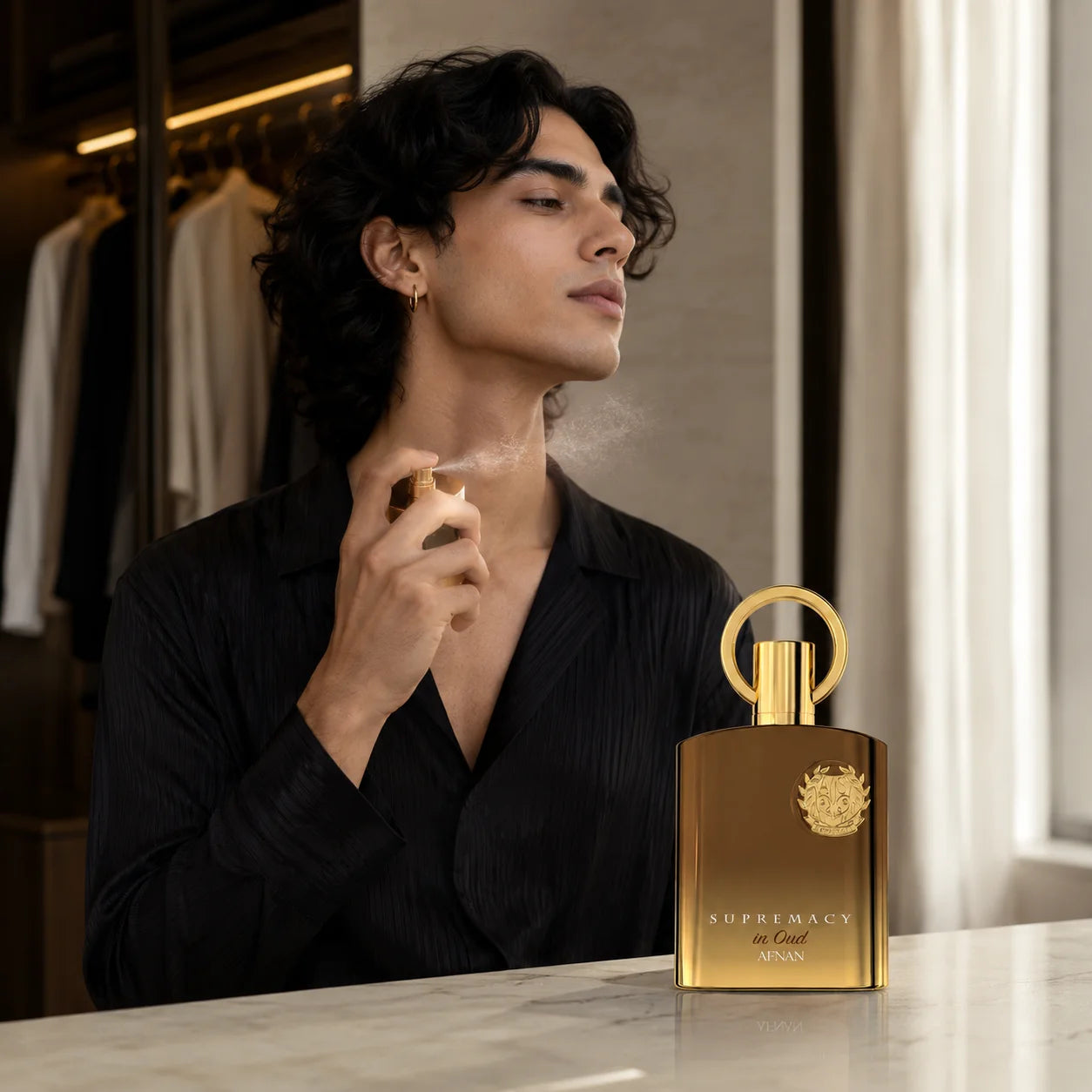 Afnan Supremacy In Oud bottle and box packaging